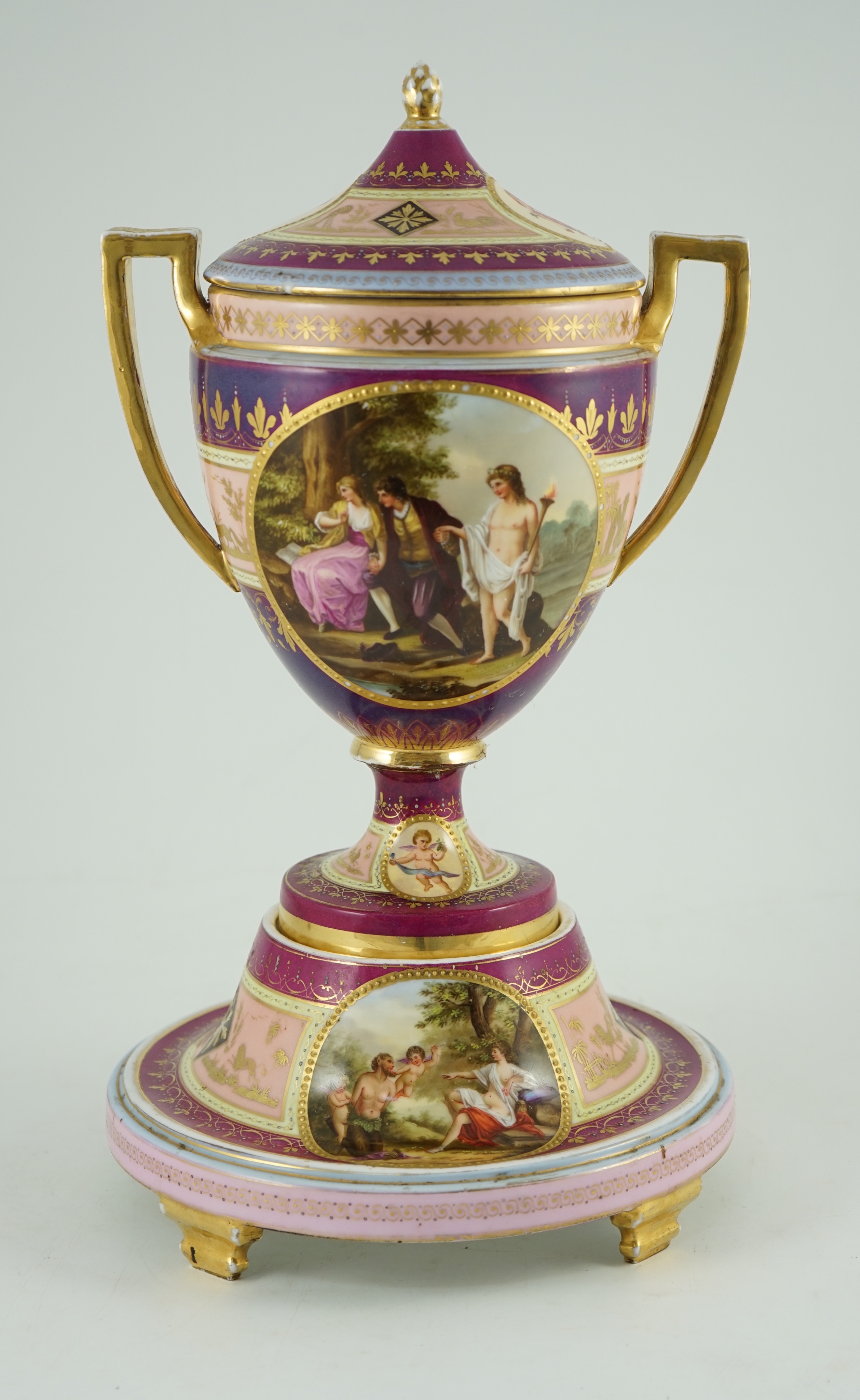 A Vienna style porcelain two handled cup, cover and stand, late 19th century, 42 cm high